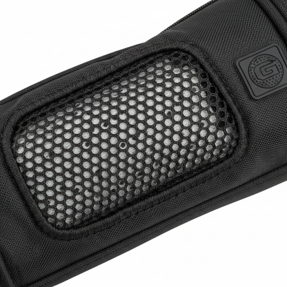 Close-up of ventilation mesh panel on black golf shoe bag